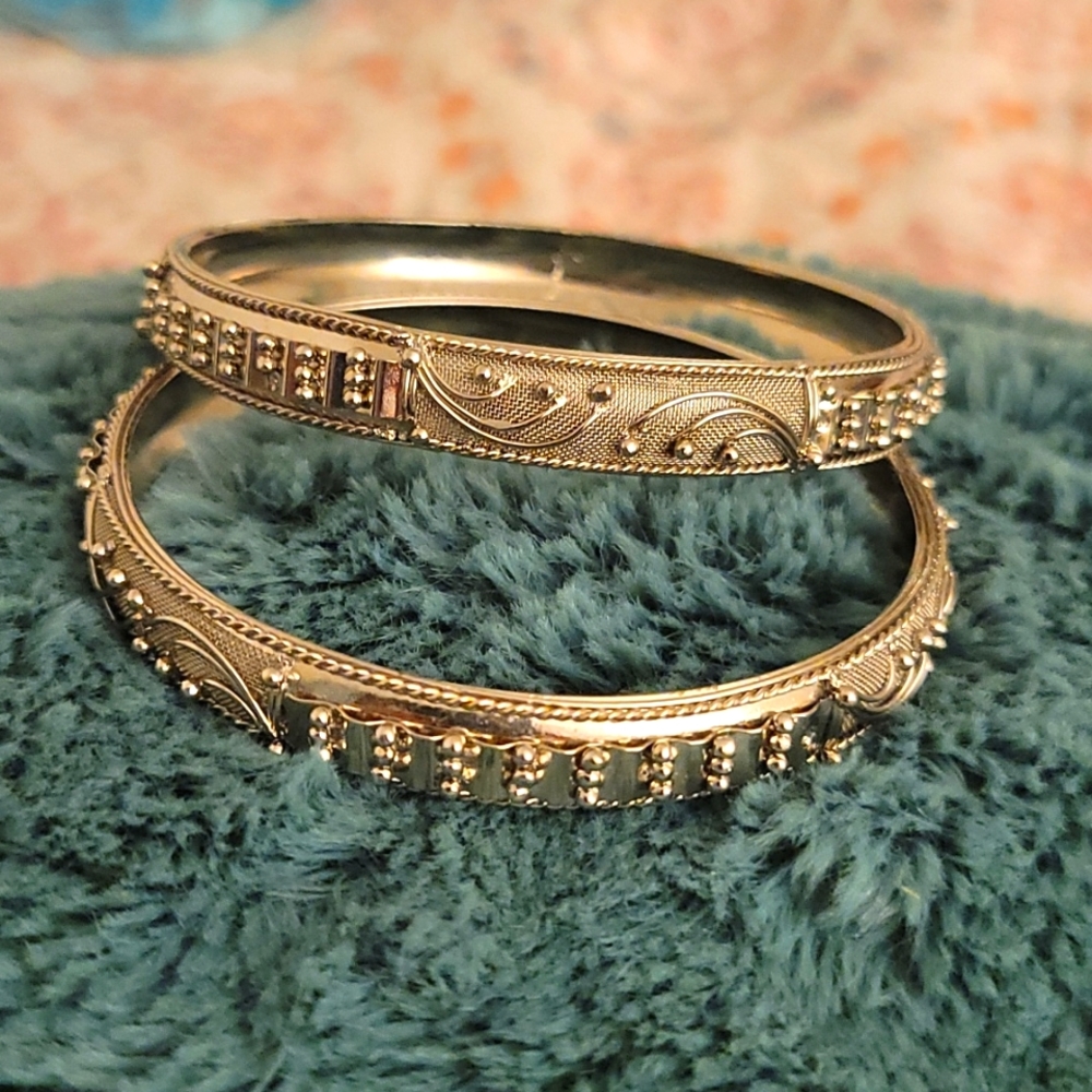 2 Silver bracelets.. hand made in Mexico..very unique..quite detailed.